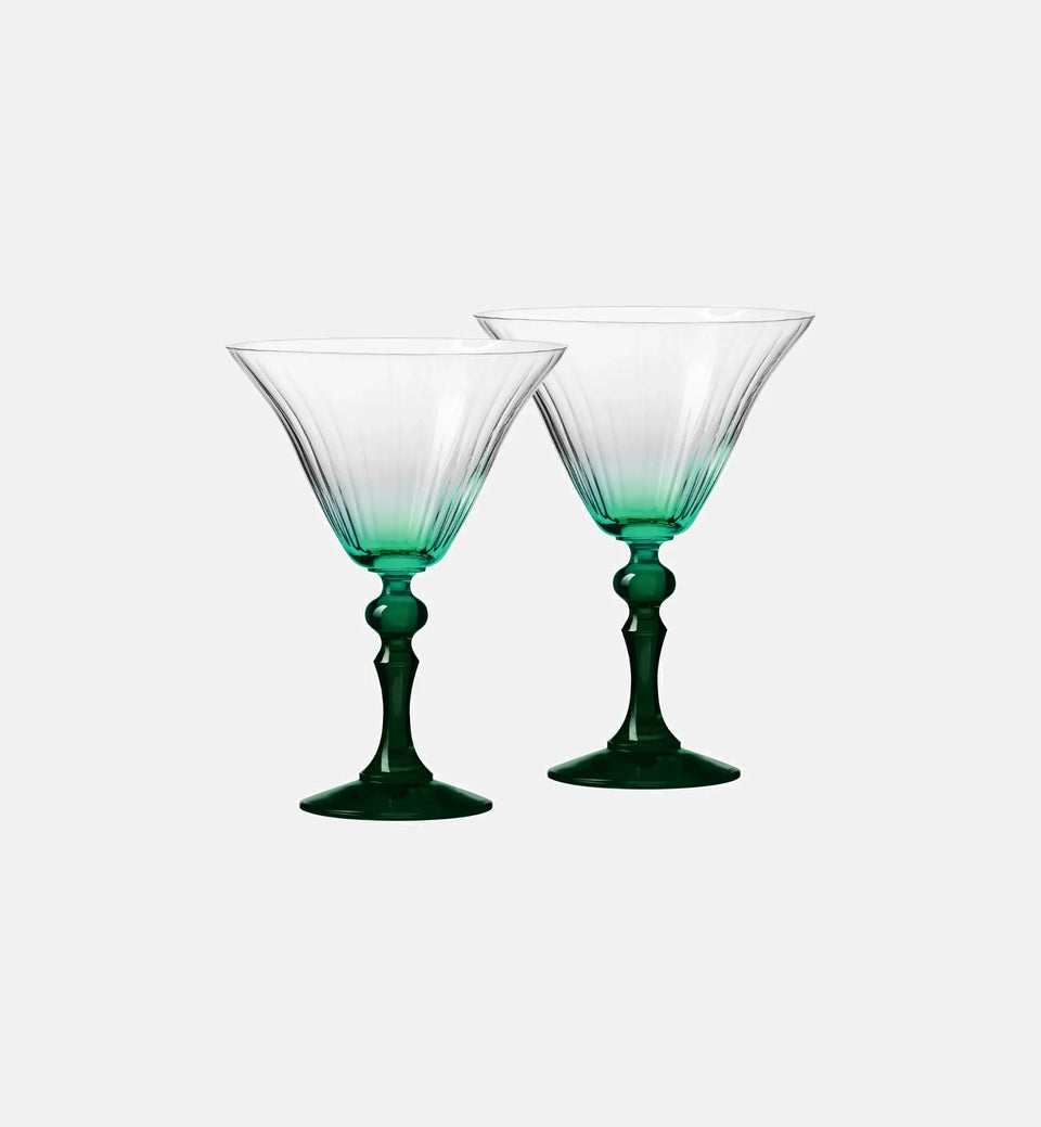 Shaded martini glasses with a dark green stem