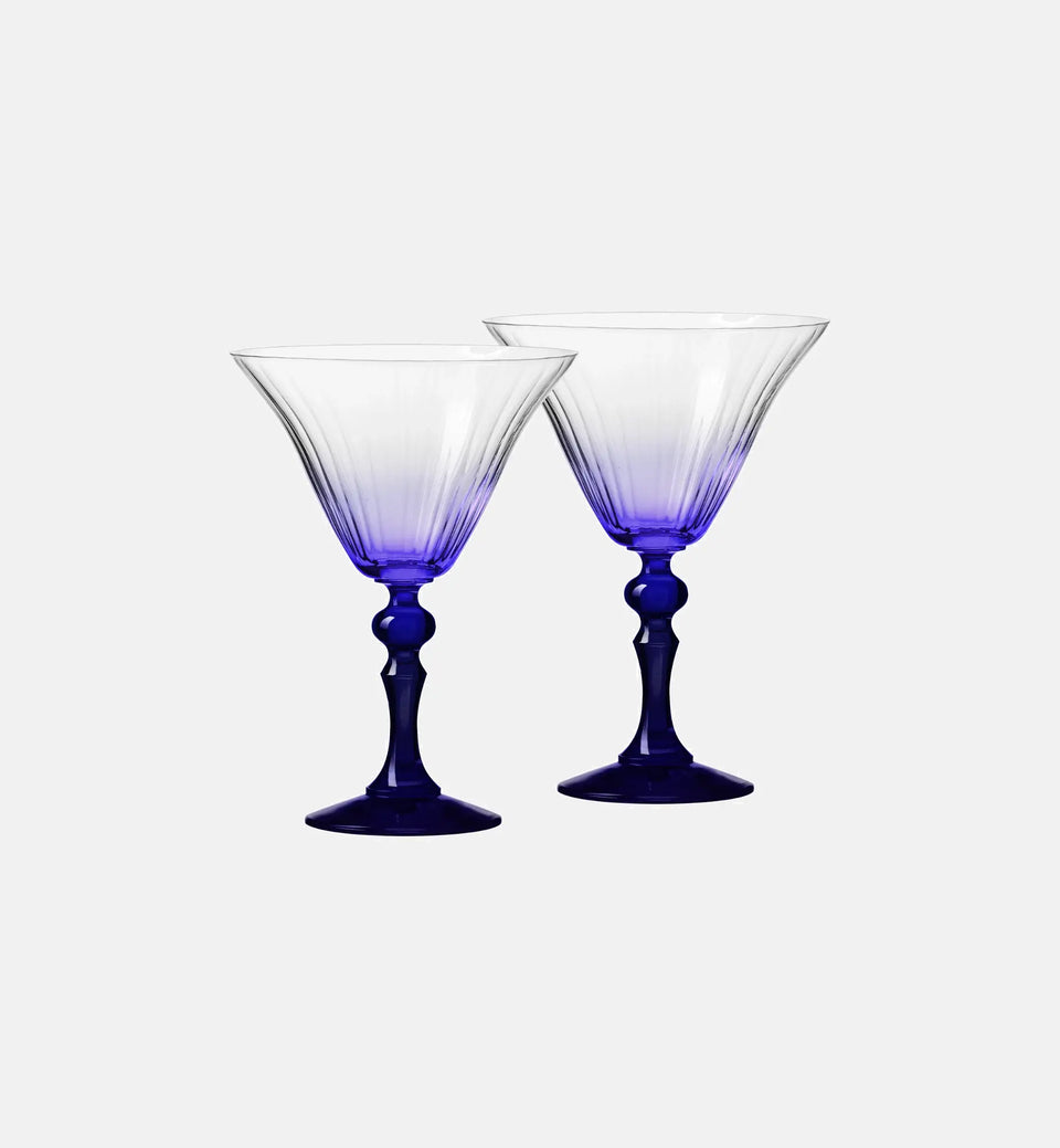 Shaded martini glasses with a navy blue stem